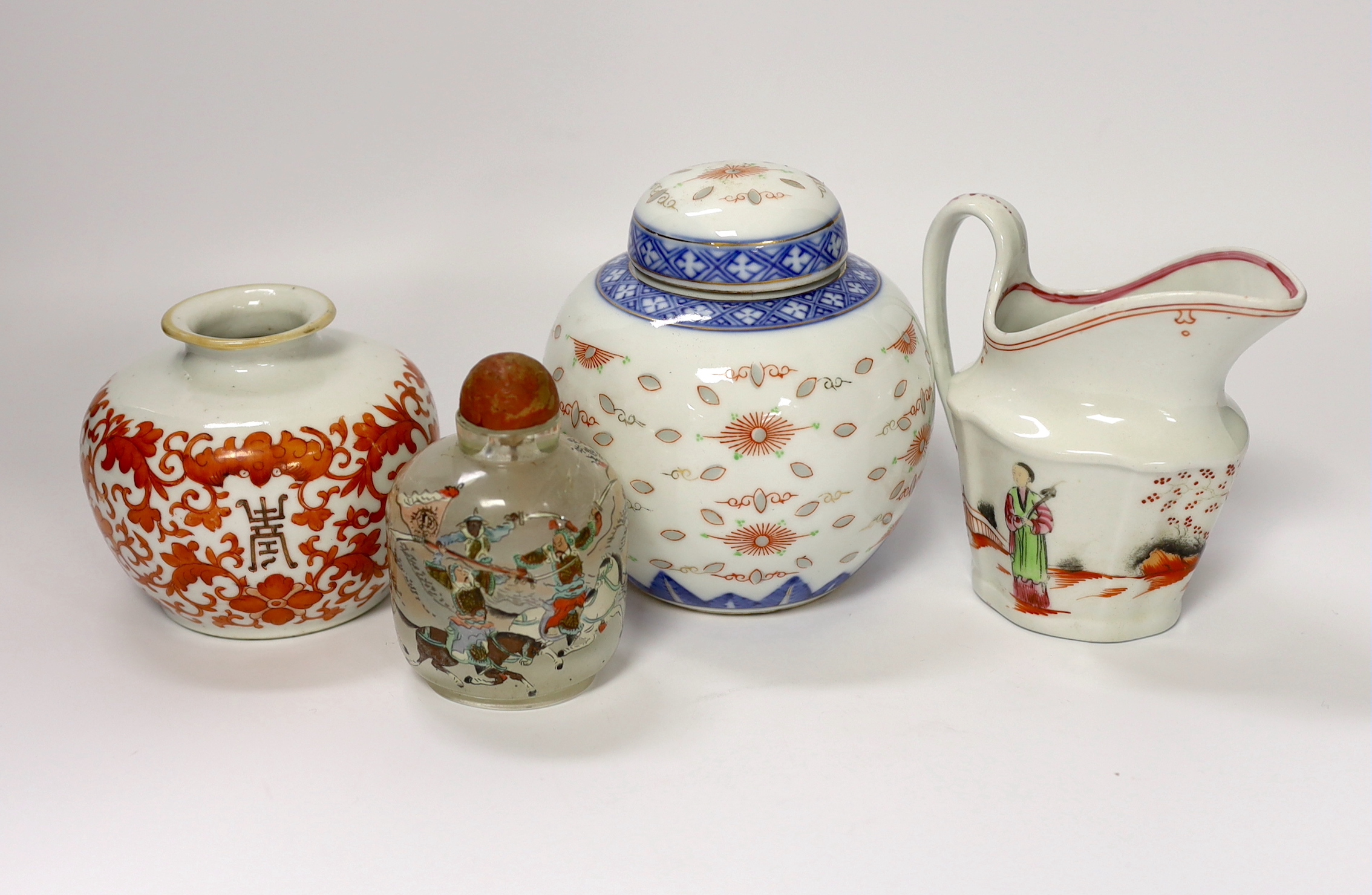 A late 18th century Newhall type jug, an early 20th century Chinese underglaze copper jar, a jar and cover and a glass snuff bottle